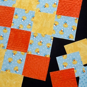 Duck rag quilt kit 96 pre cut 7" squares, orange minky, blue yellow flannel, white dots, 6 rows across, 8 rows down, rubber duck blanket
