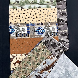 Woodland Deer Quilt Top, flannel Handmade Lap Quilt, patchwork quilt, green brown, deer bear moose silhouette, pinecone, unfinished quilt