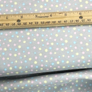 polka dot gray flannel fabric, pastel dots on light gray, yellow blue pink dots, soft warm flannel, sold by the yard