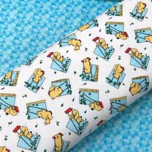 May include: White fabric with a repeating pattern of yellow bears climbing a blue rope ladder. The bears are outlined in black and have red noses. The background is white with a light blue speckled pattern.