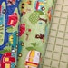 Road Trip Camp Along cotton fabric, blue green, bears, skunk, camp fire, cookout, fishing, picnic, tents, tailors, Riley Blake by yard