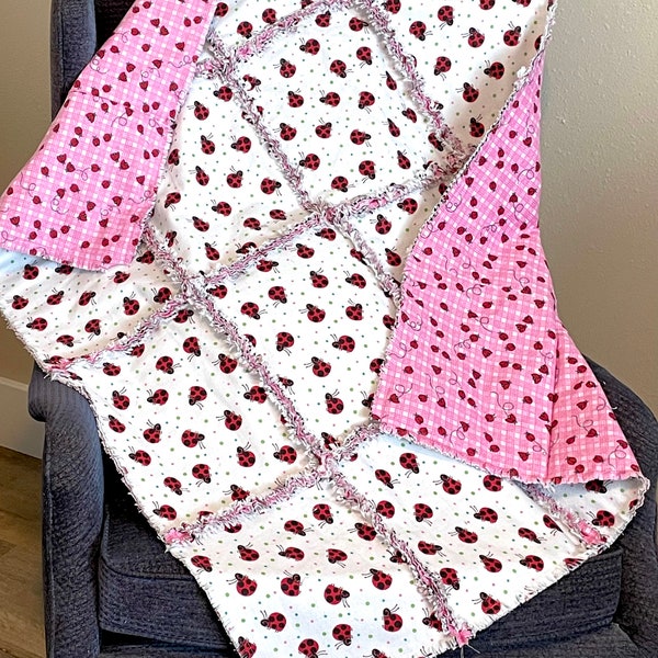 Ladybug red pink rag quilt, 3 warm flannel layers, 33 x 38,  lady bug on white, sweet baby girl soft warm blanket, baby shower gift