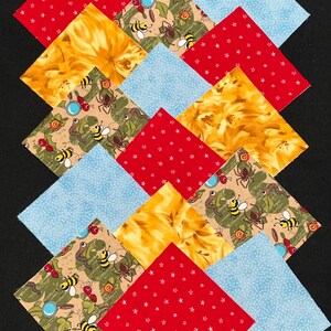May include: Arrangement of colorful fabric squares in a diamond pattern. The squares feature various designs, including red with white stars, yellow floral patterns, light blue, and a whimsical insect print. The background is black.