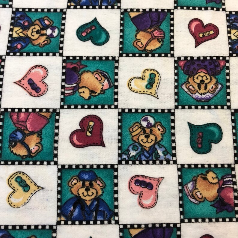 May include: A white fabric with a repeating pattern of teddy bears wearing different outfits and holding hearts. The bears are in teal, purple, pink, and blue frames with black and white borders. The hearts are in various colors, including red, pink, green, and yellow.