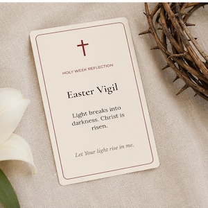 May include: A rectangular off-white card featuring a dark red cross icon, the text HOLY WEEK REFLECTION, the title Easter Vigil, and the phrases Light breaks into darkness. Christ is risen. and Let Your light rise in me. in dark text.