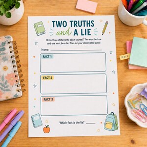 May include: A white paper worksheet titled Two Truths and a Lie with a name line, three rectangular boxes labeled Fact 1, Fact 2, and Fact 3, and a question asking which fact is the lie. The page features colorful illustrations of a book, pencil, apple, and backpack.