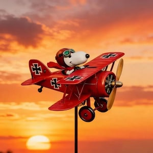 May include: A set of three ceramic mugs with a speckled, cream-colored glaze. Each mug features a different hand-painted floral design in shades of blue, green, and yellow. The mugs have a simple, rounded shape and a comfortable handle.