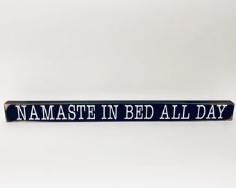 Wooden Sign Namaste in bed all day