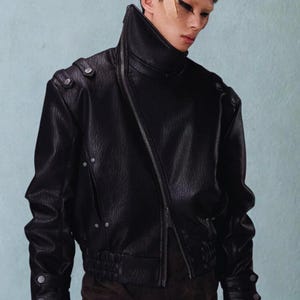 May include: A handmade wooden sign with the text "Welcome" in a playful font. The sign features a distressed white background and a dark stained wooden frame, perfect for a front door or entryway.