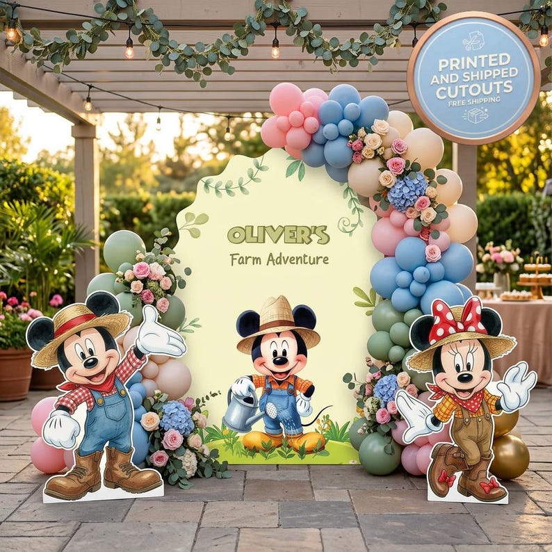 May include: A party backdrop featuring the text 'OLIVER'S Farm Adventure' with Mickey and Minnie Mouse cutouts wearing straw hats and farm clothing, surrounded by a balloon arch in shades of blue, pink, and beige with floral accents.
