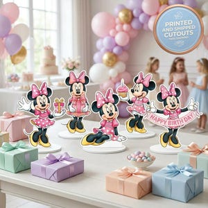 May include: A set of three ceramic mugs with a speckled, matte finish. The mugs are in shades of cream, light gray, and dark gray. Each mug has a simple, minimalist design, perfect for coffee or tea.