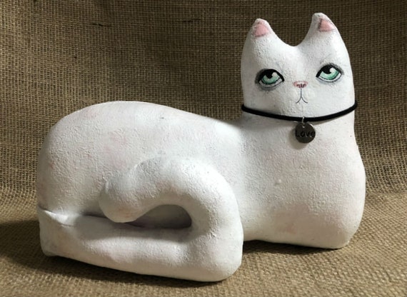 white cat doll