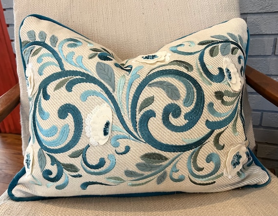 Teal embroidered pillow deals