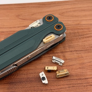 May include: A rustic wooden sign with the text "Welcome to our home" in white lettering. The sign features a distressed finish and a simple, inviting design, perfect for front door decor.