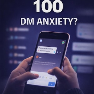 May include: A smartphone displaying a messaging app, held by hands. The screen shows a chat bubble and the text "DM ANXIETY?" with the number "100" above it. The background is a dark blue.