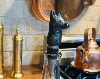 Vintage bottle wolf head bottle stopper.