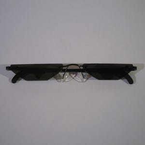 Anime slim dark rimless frameless rectangular lens cosplay plastic costume glasses.
