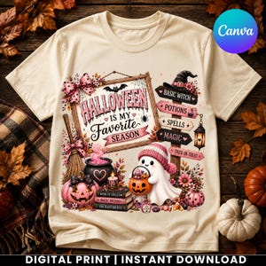 May include: A cream-colored t-shirt featuring a graphic print with a wooden sign that reads Halloween is my favorite season. The design includes a ghost, a jack-o'-lantern, a cauldron, a broom, and signs labeled Basic Witch, Potions, Spells, Magic, and Trick or Treat.