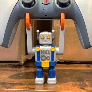 Dualsense Controller Stand | Retro Toy-Robot Holder |  “ROBO-VERALLS” Display Figure LIFTS Your Gamepad! | PS5 Mount