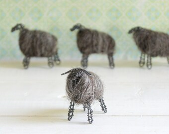 Wired lamb with dark wool