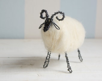 Wired ram with white wool