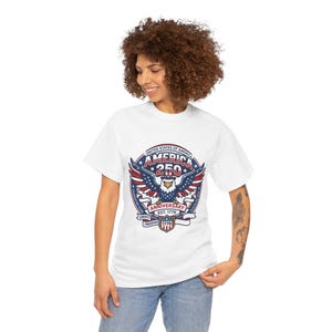 White t-shirt with America 250th anniversary logo featuring an eagle and patriotic text.