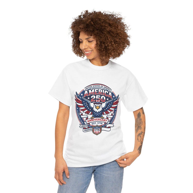 White t-shirt with America 250th anniversary logo featuring an eagle and patriotic text.