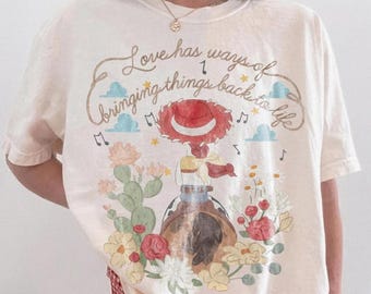 Jessie Toy Story Shirt, Love Has A Way Of Bringing Things Back To Life Tee, Cowgirl Graphic Shirt, Disney Inspired Floral Western Tee