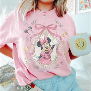 Minnie Mouse Coquette Shirt, Pink Bow Disney Graphic Tee, Cute Minnie Mouse Aesthetic Top, Disney Vacation Shirt, Minnie Fan Gift Blossom/Light Pink