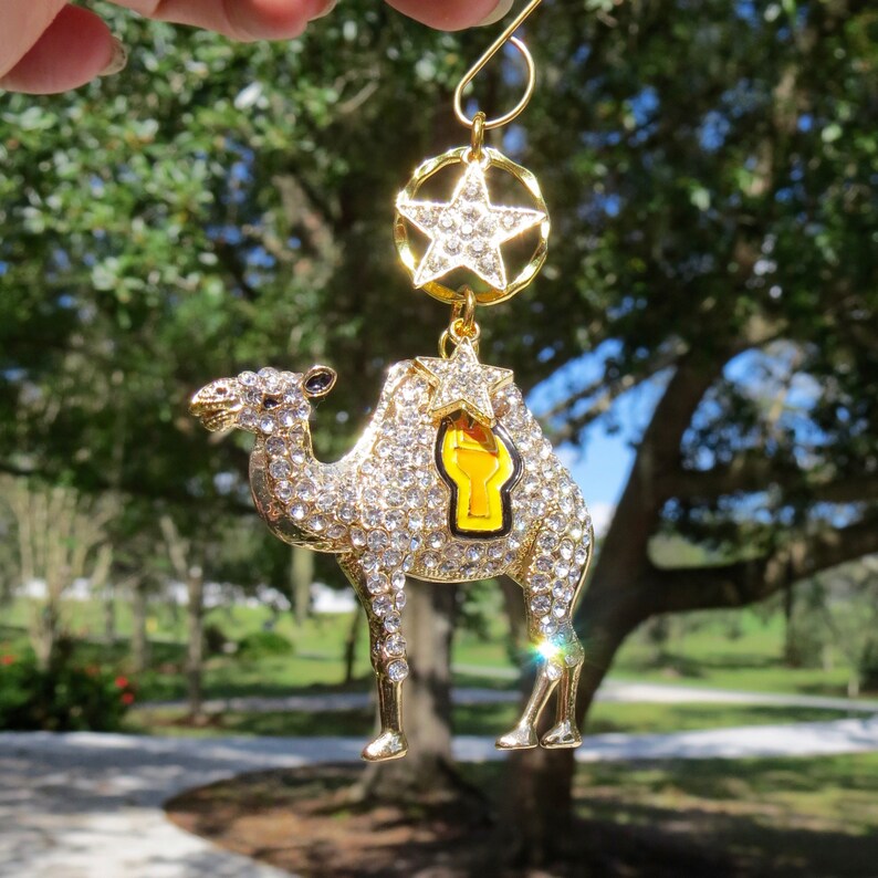 The CAMEL/'S STAR Gold Rhinestone Camel Christmas Ornament