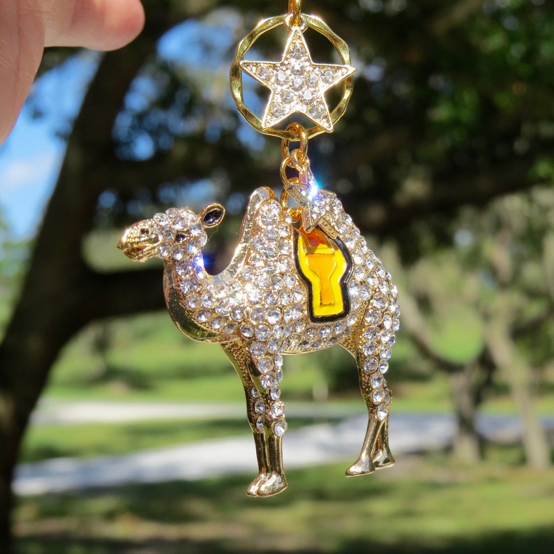 The CAMEL/'S STAR Gold Rhinestone Camel Christmas Ornament