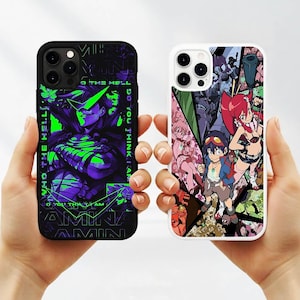 May include: Two phone cases with anime-style graphics. One case is black with a green and purple character design and the text "WHO THE HELL DO YOU THINK I AM?". The other case is white with a colorful collage of anime characters.