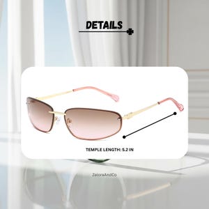 May include: Rimless sunglasses with a gradient brown tint and pink temples. The temple length is 5.2 inches. The frame is gold-colored. The sunglasses have a sleek, modern design.