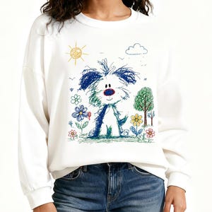 May include: A white long-sleeve sweatshirt featuring a colorful, scribbled-style graphic of a dog. The design includes a yellow sun, a blue cloud, green trees, and various multi-colored flowers surrounding the central dog figure.