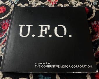 UFO A Product of The Combustive Motor Corporation | 2006 First Edition with Insert