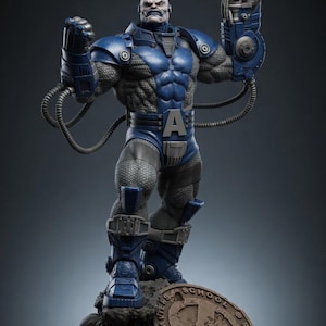 May include: A detailed statue of the Marvel Comics character Apocalypse. The figure is predominantly blue and gray, with intricate armor and a menacing expression. He stands on a base of skulls, holding a weapon. The base includes a bronze-colored emblem.