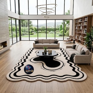 Handgetuft abstract golvend tapijt met rand – zwart crème tapijt van biologische wol