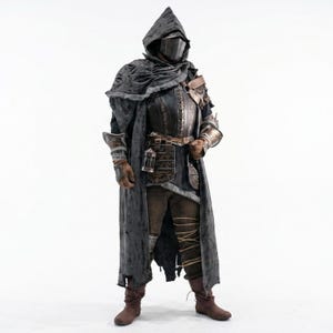 May include: A complete costume comprising a hooded cloak, metallic armour, and a helmet. The outfit includes a dark grey cloak, brown trousers, and boots. The armour has detailed patterns and a worn look, hinting at a fantasy or historical setting.