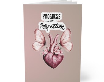 Kolekcja „Naprawiające się serce” | Notatnik „Postęp, nie perfekcja” w kształcie serca z motylami | Notatnik w miękkiej oprawie A5