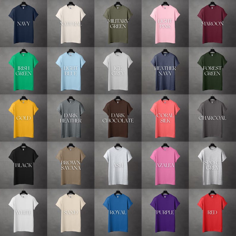 May include: A grid of twenty-five t-shirts in various colors, each displayed on a hanger. Colors include navy, natural, military green, light pink, maroon, Irish green, light blue, ice grey, heather navy, forest green, gold, dark heather, dark chocolate, coral silk, charcoal, black, brown savana, ash, azalea, sport grey, white, sand, royal, purple, and red.