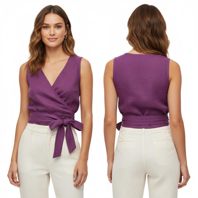May include: A sleeveless wrap top in a deep purple hue, featuring a V-neckline and a fabric tie closure at the waist. The garment is shown from both the front and back views, highlighting the wrap-around design and the tied bow detail.