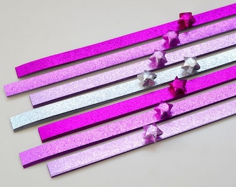 Tiras de papel de origami con polvo de hadas en tonos rosados para crear tu propia estrella de la suerte (paquete de 80)