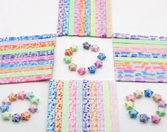 Tiras de papel de origami con forma de corazón, corona de flores y estrellas de la suerte, 10 colores luminosos que brillan en la oscuridad (paquete de 210 unidades)