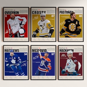 May include: Six framed hockey player posters. Each poster features a player's image, name, number, and team logo. The posters have a minimalist design with a neutral background and bold text.