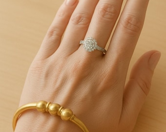Gold-tone Infinity Ring with Shimmering Stones – Elegant Handmade Jewelry