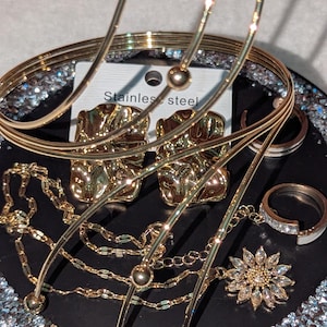 Luxury Gold Jewelry Set: Large square elegant earrings, Sunflower Necklace, 2 Classy Rings with Sparkles, Adjustable Upper Arm Cuff Bangle.