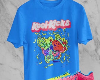 Camiseta Kool Kicks, a juego con las zapatillas JA 3 Kool Aide