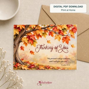 May include: A rectangular greeting card featuring a tree with vibrant orange, red, and yellow autumn leaves. The text reads Thinking of You and My presence will go with you, and I will give you rest. Exodus 33:14. A digital PDF download label is visible.