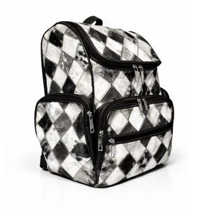 May include: A black and white diamond-patterned backpack with multiple zippered compartments. The bag features a top handle and adjustable straps. The design incorporates a patchwork style with a mix of black, white, and gray tones, creating a unique and stylish accessory.