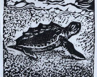 Linograbado de tortuga marina bebé